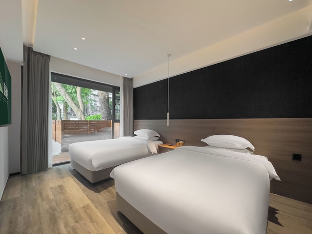 Imagen de la habitación del Hotel TRAVEL TREE INN. Foto 6