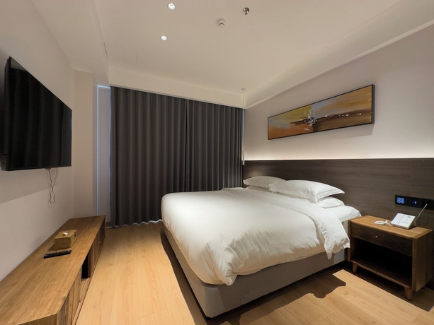 Imagen de la habitación del Hotel TRAVEL TREE INN. Foto 10