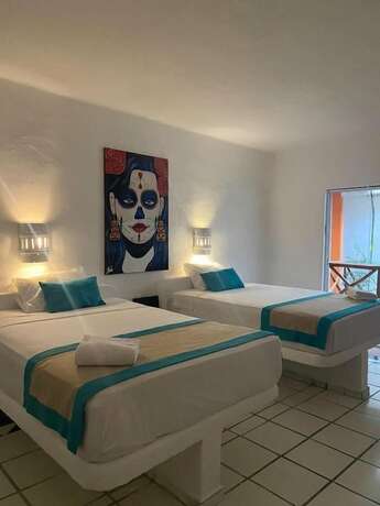 Imagen de la habitación del Hotel TREBOL HOTEL, Playa del Carmen. Foto 11