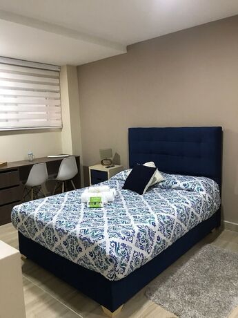 Imagen de la habitación del Hotel TRIBU18. Foto 15
