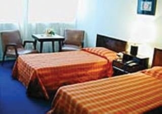 Imagen de la habitación del Hotel TROCADERO OTHON TRAVEL. Foto 3