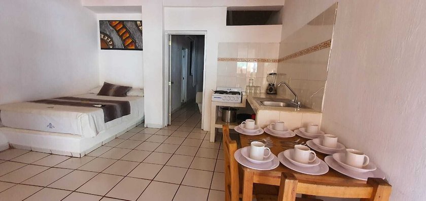 Imagen de la habitación del Hotel TROPICAL SUITE. Foto 7