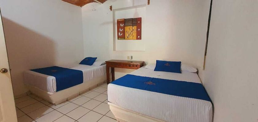 Imagen de la habitación del Hotel TROPICAL SUITE. Foto 8