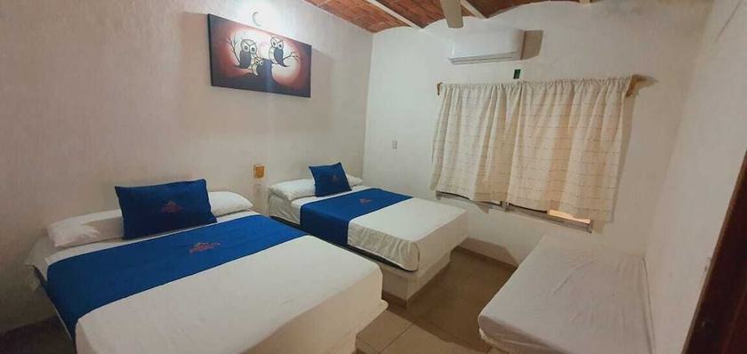Imagen de la habitación del Hotel TROPICAL SUITE. Foto 11