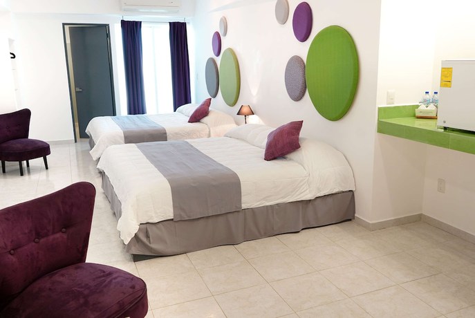 Imagen de la habitación del Hotel TRYP by Wyndham Chetumal. Foto 3