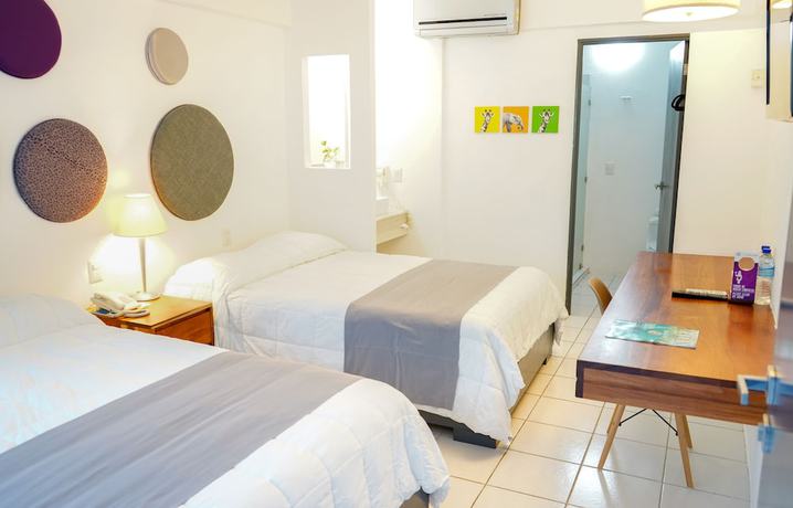 Imagen de la habitación del Hotel TRYP by Wyndham Chetumal. Foto 11