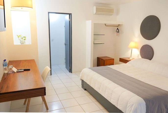 Imagen de la habitación del Hotel TRYP by Wyndham Chetumal. Foto 16