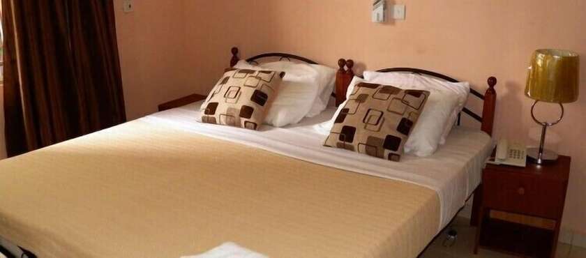 Imagen de la habitación del Hotel TS Lodgings. Foto 14