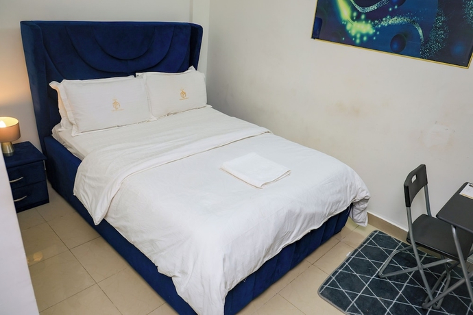Imagen de la habitación del Hotel T-Square Residence Makepe. Foto 1