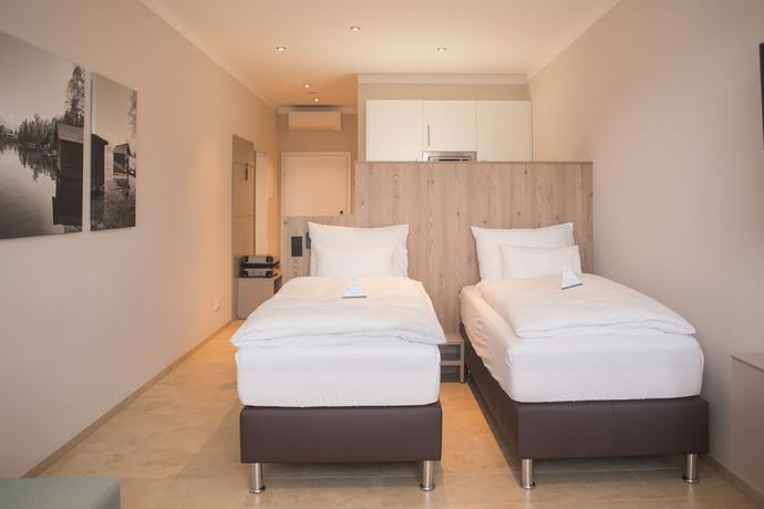 Imagen de la habitación del Hotel TT Aparthotel Neuhofen. Foto 14