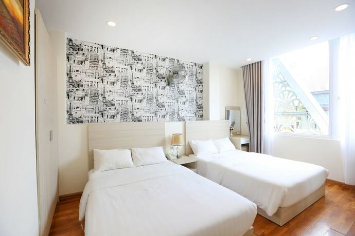 Imagen de la habitación del Hotel TTR Vincent. Foto 11