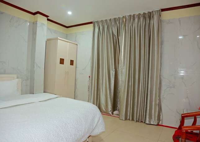 Imagen de la habitación del Hotel TUAN CENTRAL HOTEL. Foto 15