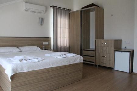 Imagen de la habitación del Hotel TUGAY. Foto 18
