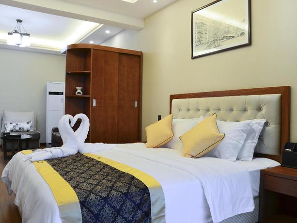 Imagen general del Hotel TUJIA SWEETOME VACATION RENTALS EMEI QINGLU HOTEL. Foto 4