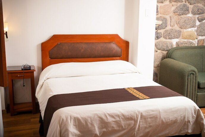 Imagen de la habitación del Hotel TURI WASI HOUSE BOUTIQUE. Foto 13