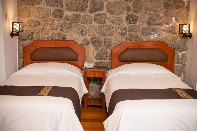Imagen de la habitación del Hotel TURI WASI HOUSE BOUTIQUE. Foto 15