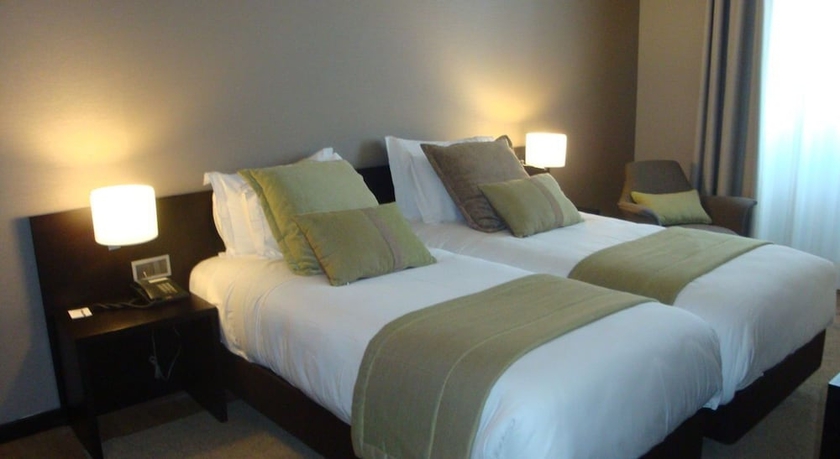 Imagen de la habitación del Hotel TURIM Aveiro Palace. Foto 9