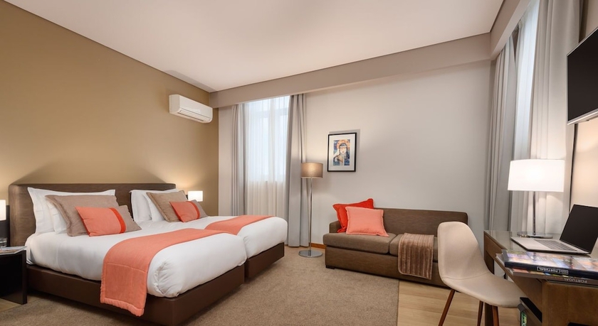 Imagen de la habitación del Hotel TURIM Aveiro Palace. Foto 11