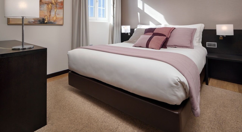 Imagen de la habitación del Hotel TURIM Aveiro Palace. Foto 12