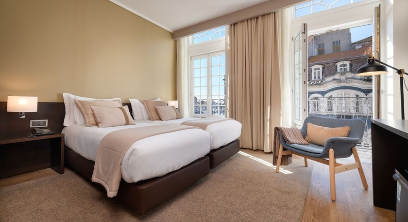 Imagen de la habitación del Hotel TURIM Aveiro Palace. Foto 15