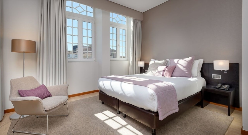 Imagen de la habitación del Hotel TURIM Aveiro Palace. Foto 16