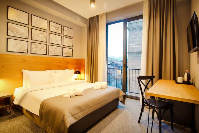 Imagen de la habitación del Hotel TUTA. Foto 3