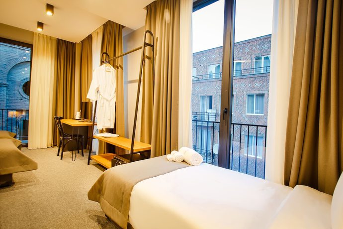 Imagen de la habitación del Hotel TUTA. Foto 14