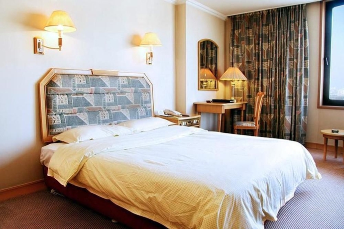 Imagen de la habitación del Hotel TWENTY-FIRST CENTURY. Foto 2