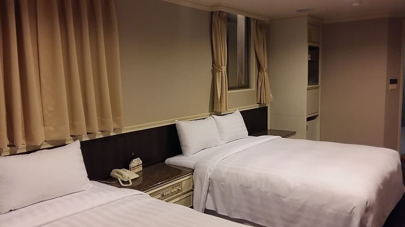 Imagen de la habitación del Hotel Ta Lee. Foto 9
