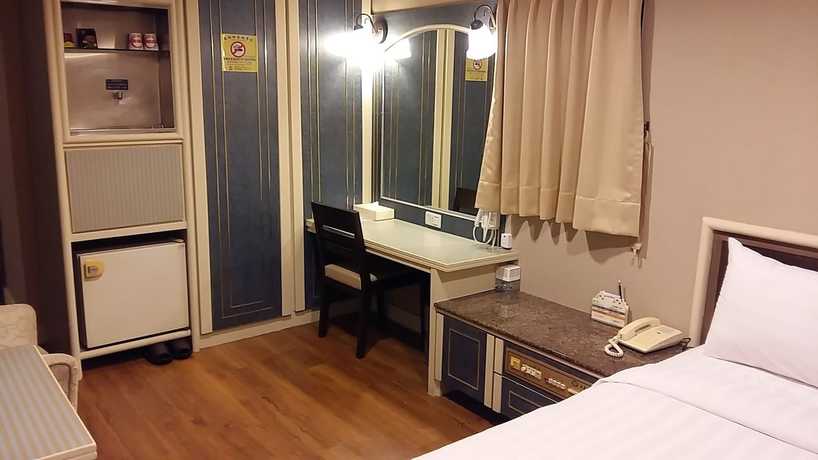 Imagen de la habitación del Hotel Ta Lee. Foto 11