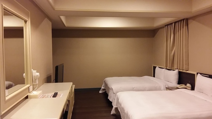 Imagen de la habitación del Hotel Ta Lee. Foto 13