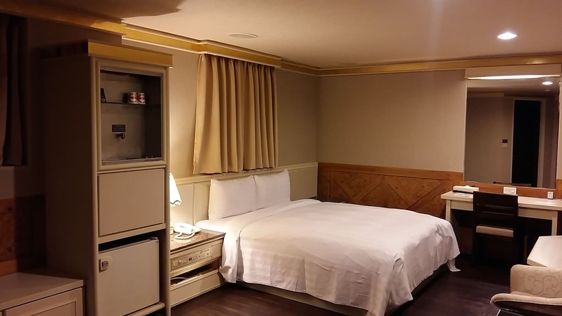 Imagen de la habitación del Hotel Ta Lee. Foto 16