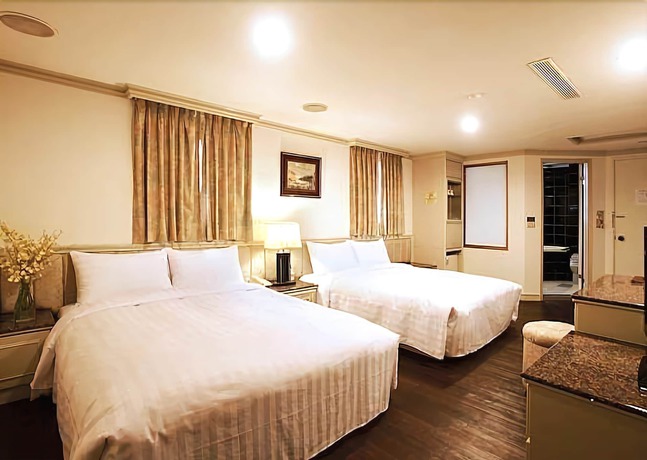 Imagen de la habitación del Hotel Ta Lee. Foto 18