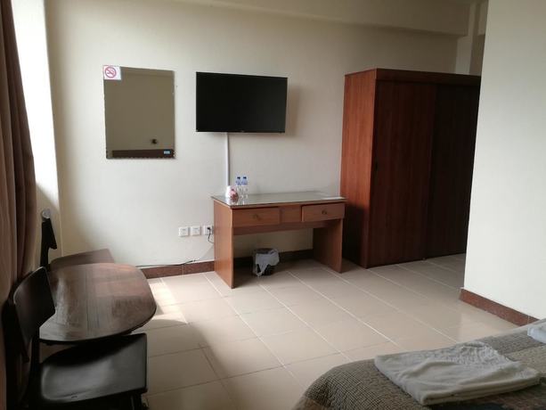 Imagen de la habitación del Hotel TaTa Chino. Foto 6