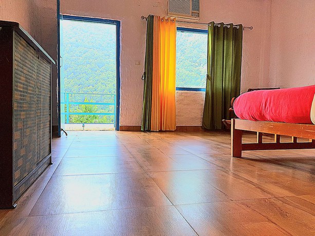 Imagen de la habitación del Hotel Taarini Corbett. Foto 11