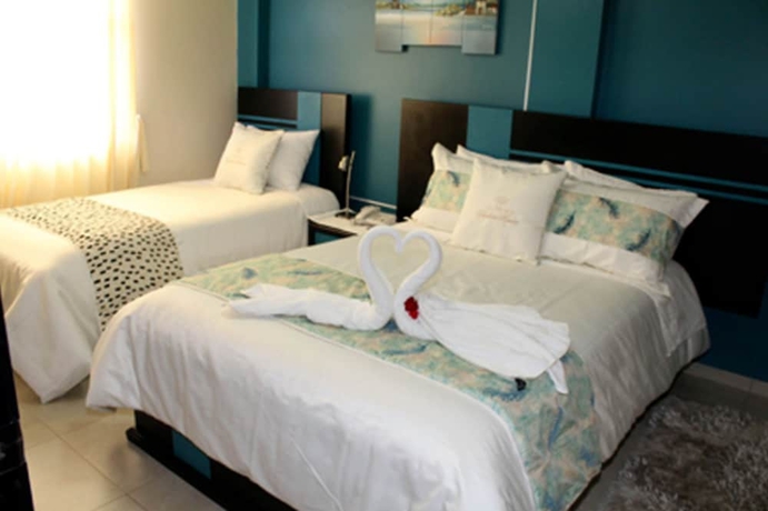 Imagen de la habitación del Hotel Tababela Land. Foto 3