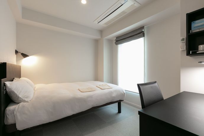 Imagen de la habitación del Hotel Tabard Tokyo. Foto 7