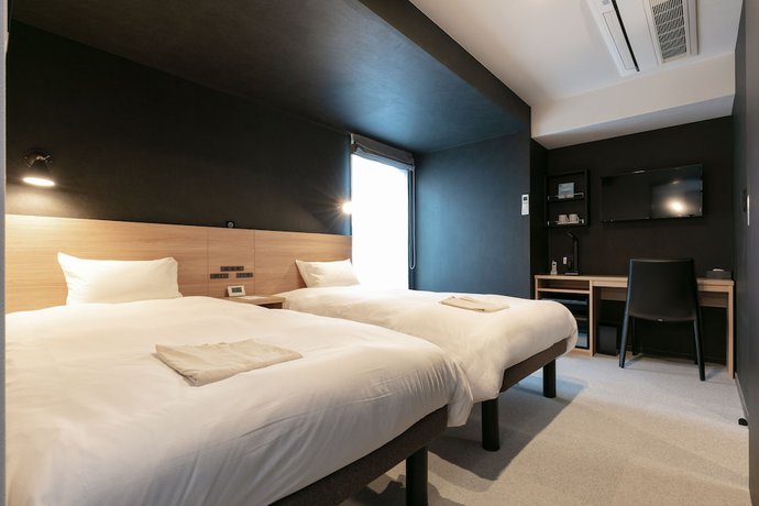 Imagen de la habitación del Hotel Tabard Tokyo. Foto 9