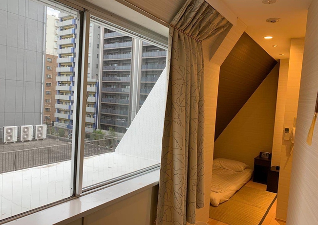 Imagen de la habitación del Hotel Tabata Oji. Foto 10