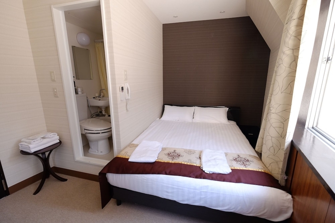 Imagen de la habitación del Hotel Tabata Oji. Foto 15