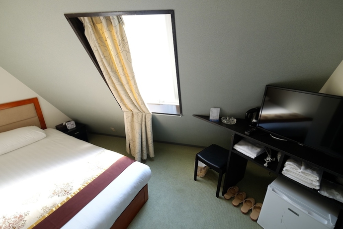 Imagen de la habitación del Hotel Tabata Oji. Foto 17