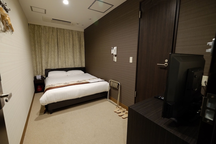 Imagen de la habitación del Hotel Tabata Oji. Foto 18