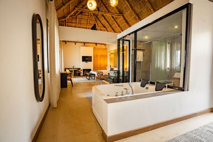 Imagen de la habitación del Hotel Tabebuia Spa and Safari Resort. Foto 17