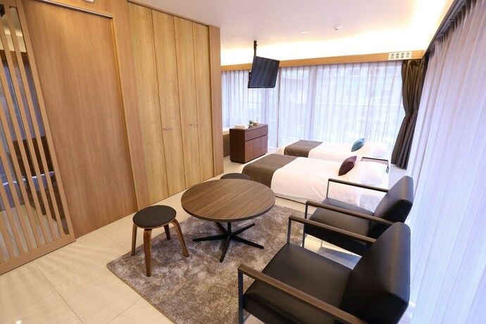 Imagen de la habitación del Hotel Tabinoteitaku Okinawa Naha. Foto 25