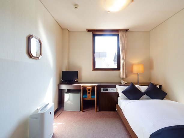 Imagen de la habitación del Hotel Tabist Business Fujiya. Foto 2