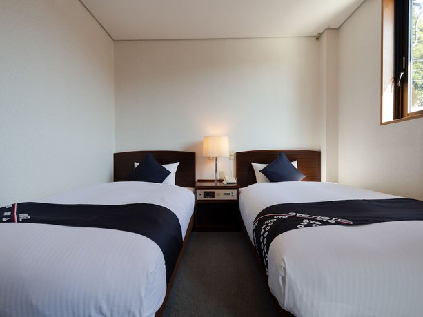 Imagen de la habitación del Hotel Tabist Business Fujiya. Foto 9