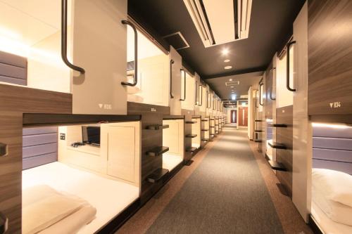 Imagen de la habitación del Hotel Tabist CapsuleHotel APODS Himeji Station. Foto 7