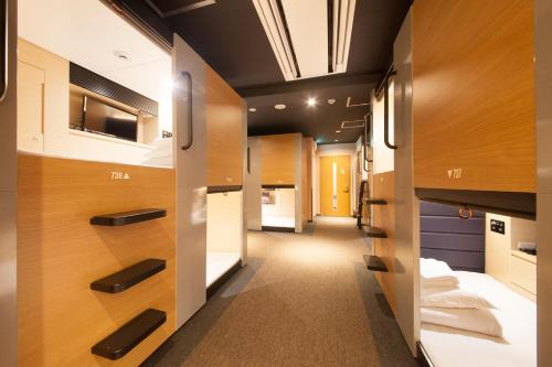Imagen de la habitación del Hotel Tabist CapsuleHotel APODS Himeji Station. Foto 8
