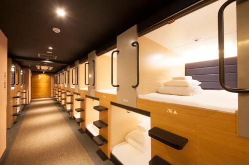 Imagen de la habitación del Hotel Tabist CapsuleHotel APODS Himeji Station. Foto 9