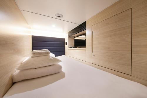 Imagen general del Hotel Tabist CapsuleHotel APODS Himeji Station. Foto 3